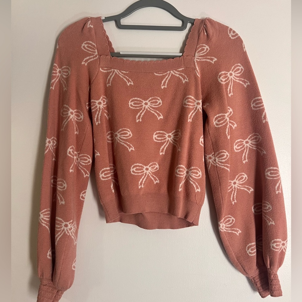 Pink Sweater with Bow Pattern
